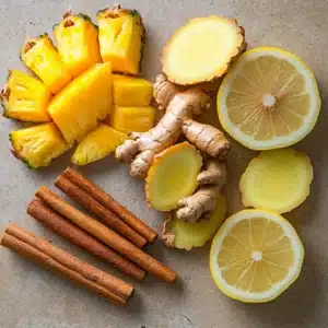 Ingredients for Costa Rican Tea Recipe for Weight Loss: ginger, turmeric, cinnamon, pineapple, and lemon.